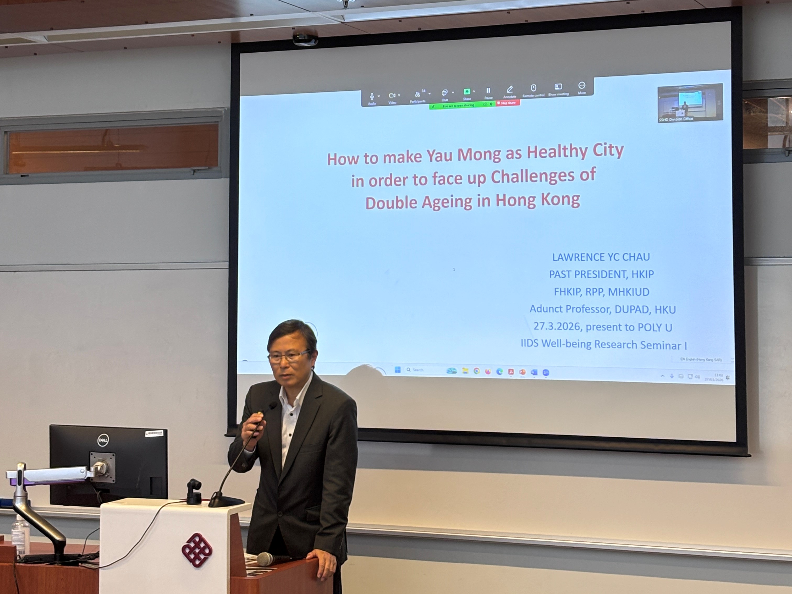 Mr Lawrence Chau delivering his presentation