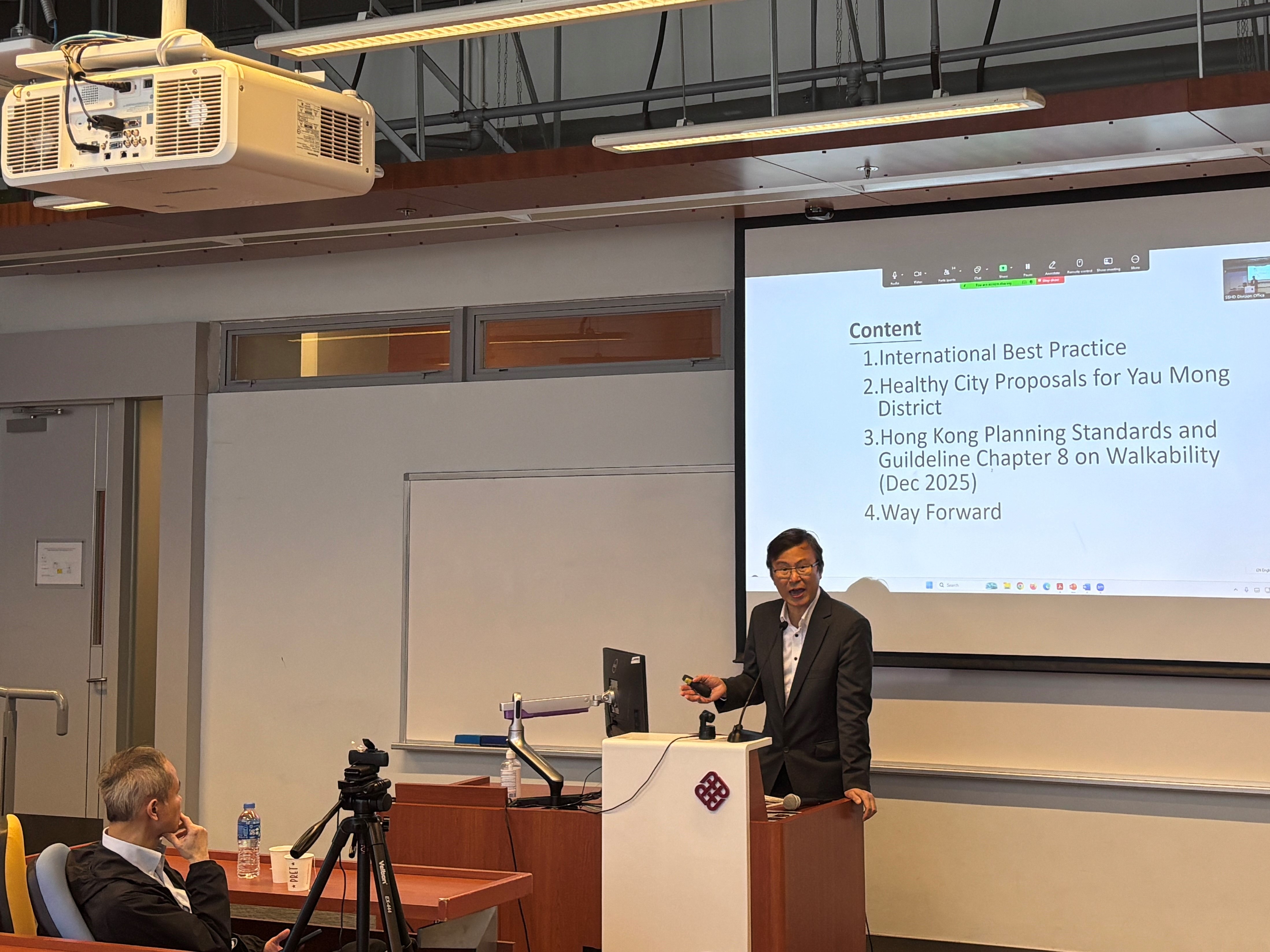 Mr Lawrence Chau delivering his presentation